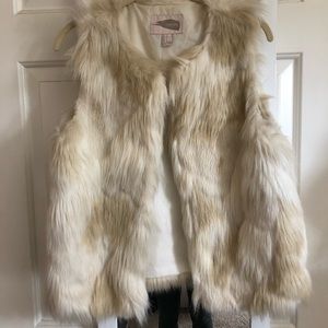 White faux fur vest